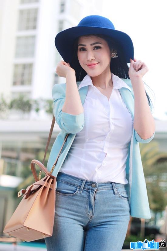  Image of young actress Maria Dinh Phuong Anh walking down the street