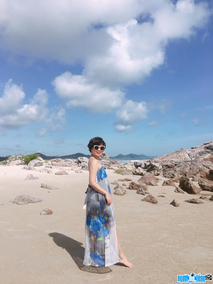  Picture of designer Ha Minh Phuc posing on the beach