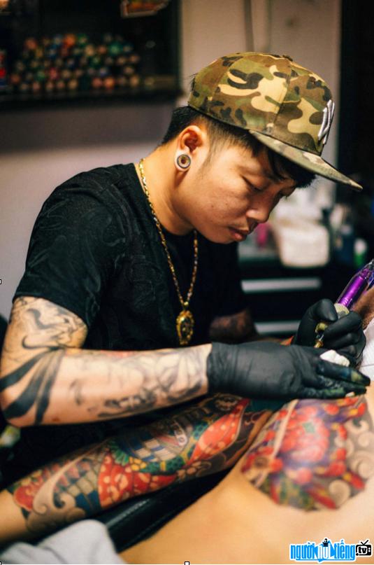 Portrait of Lam Van Viet who erases tattoo stereotypes