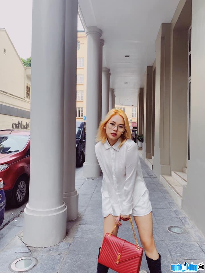 Rose Nguyen's personality with bangs orange blonde hair