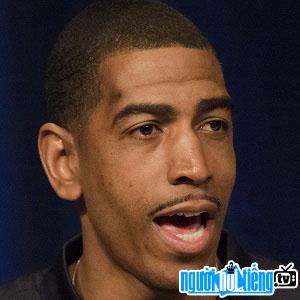 Basketball players Kevin Ollie